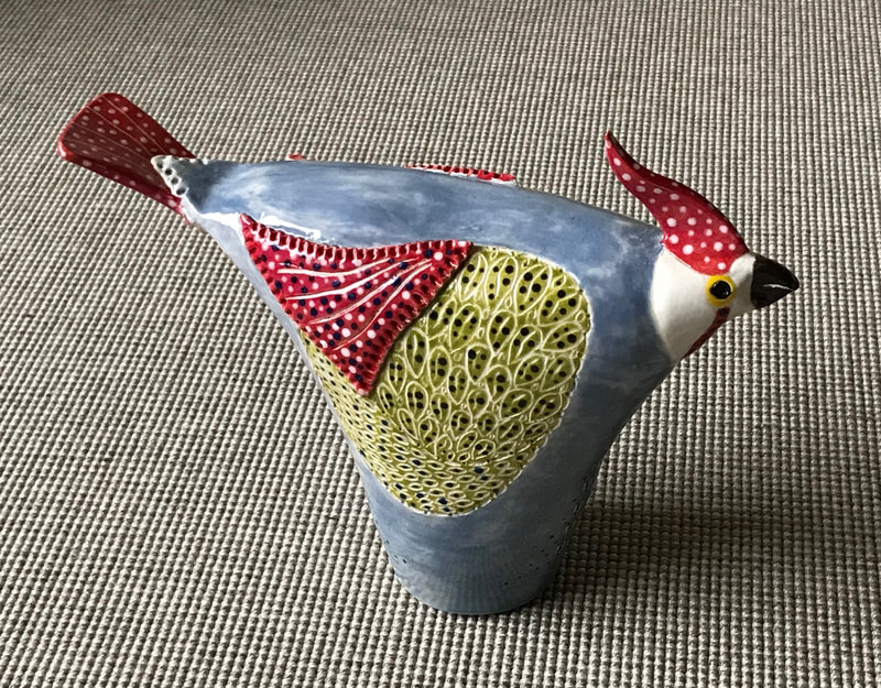 photo of a ceramic bird