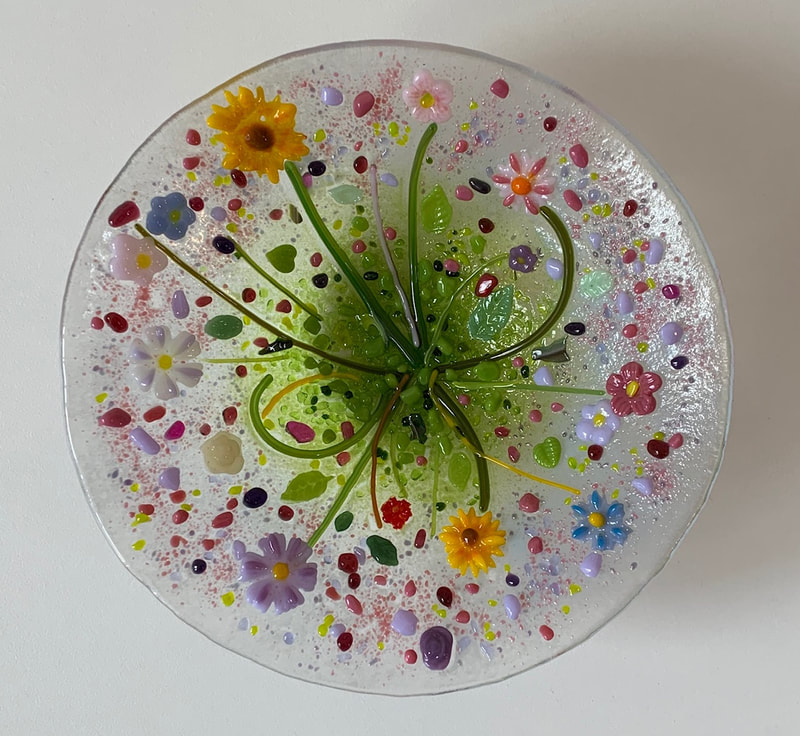 Fused glass bowl with colourful flowers